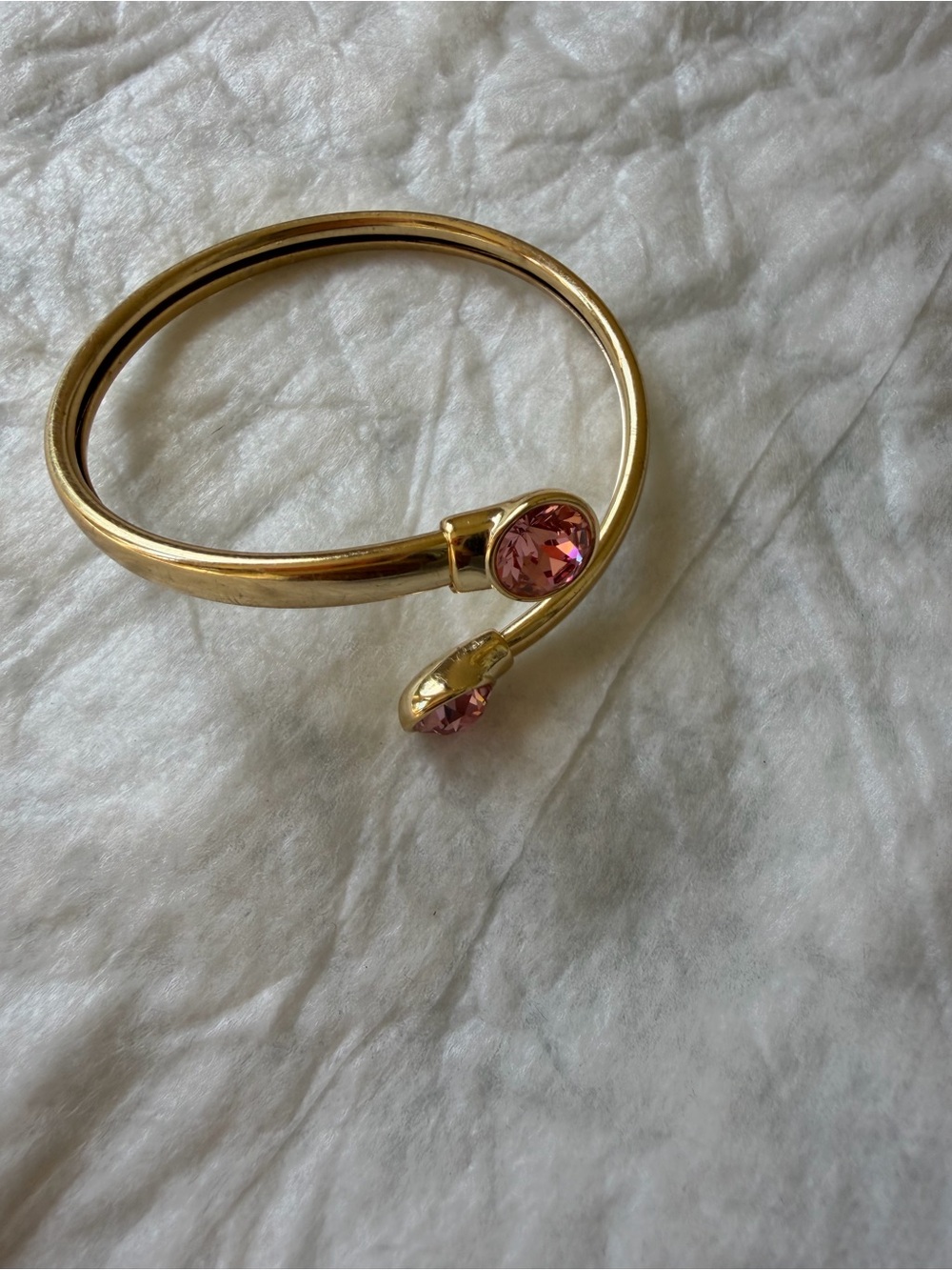 Goldtone Open-Ended Bangle Bracelet with Pink Gemstone Accents